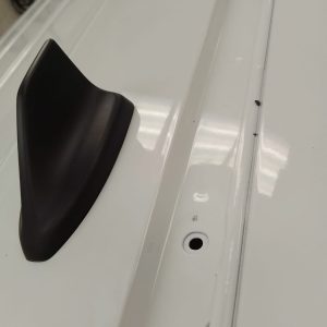 Ford Transit Connect front roof mounting point with cover removed